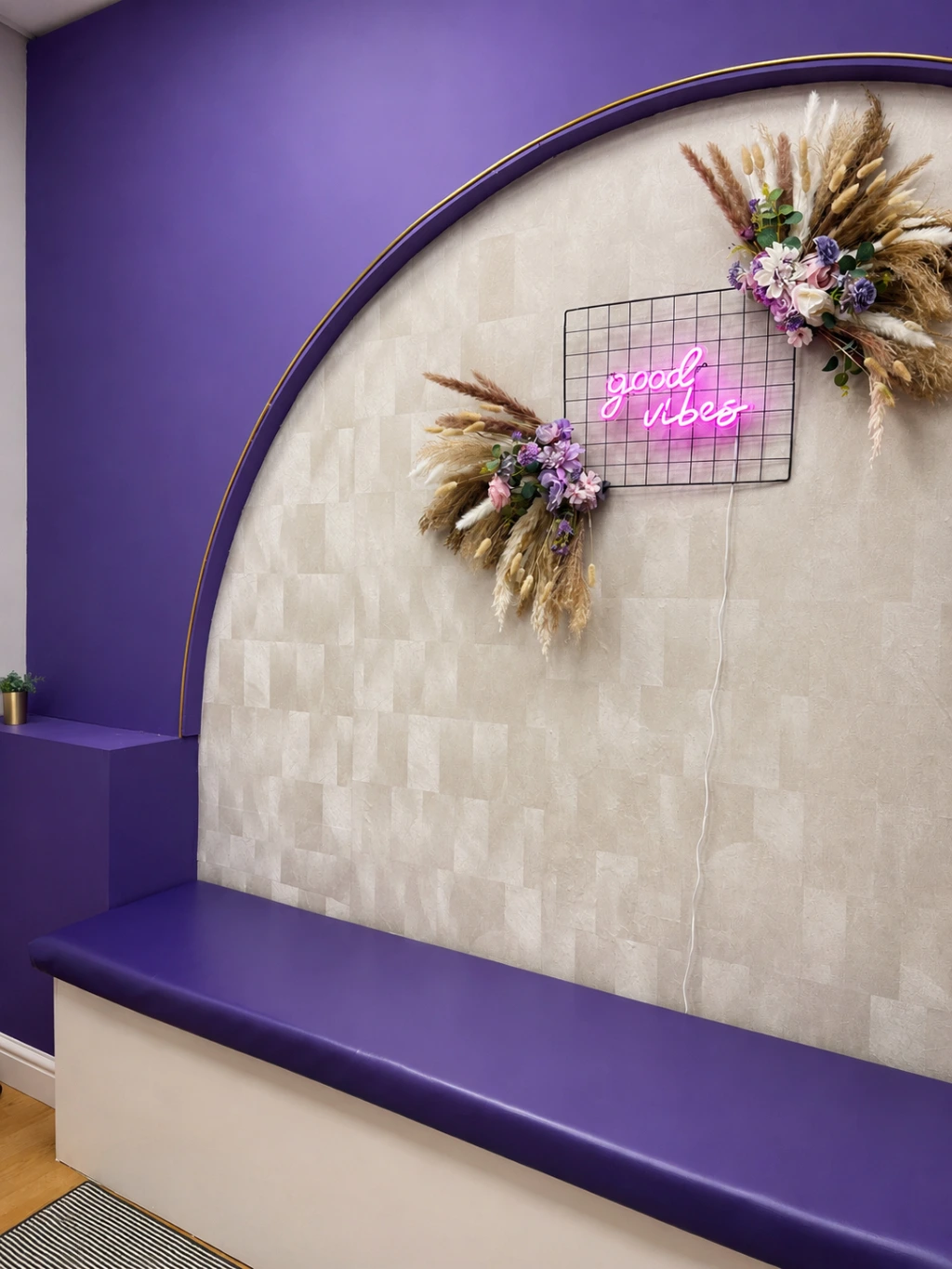 A cost-effective design feature combining colour, texture, and styling to elevate the customer experience without exceeding the project budget. Budget-friendly feature wall and seating area designed to create visual impact within the Choco Me dessert shop interior.