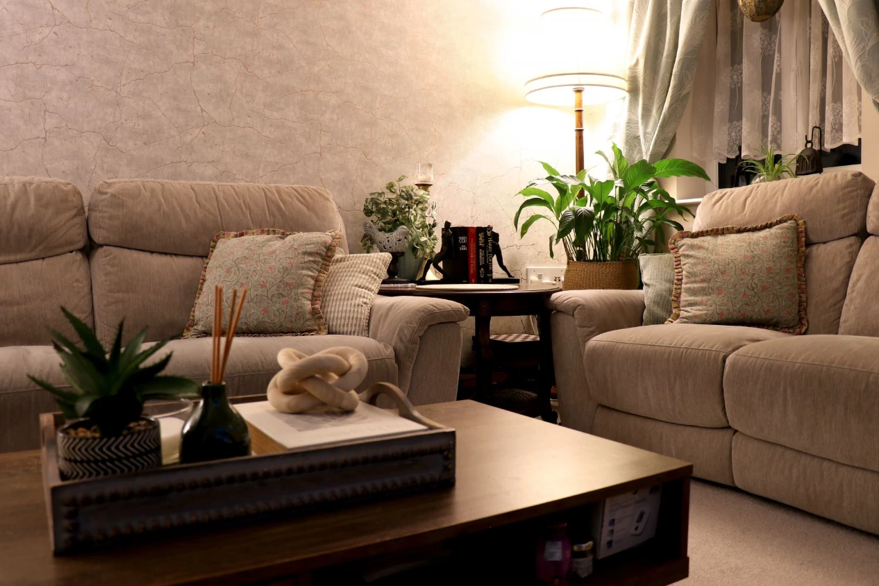 Custom living room interior design by House of Ahana featuring cozy sofa seating, warm lighting and styled decor in Bradford UK