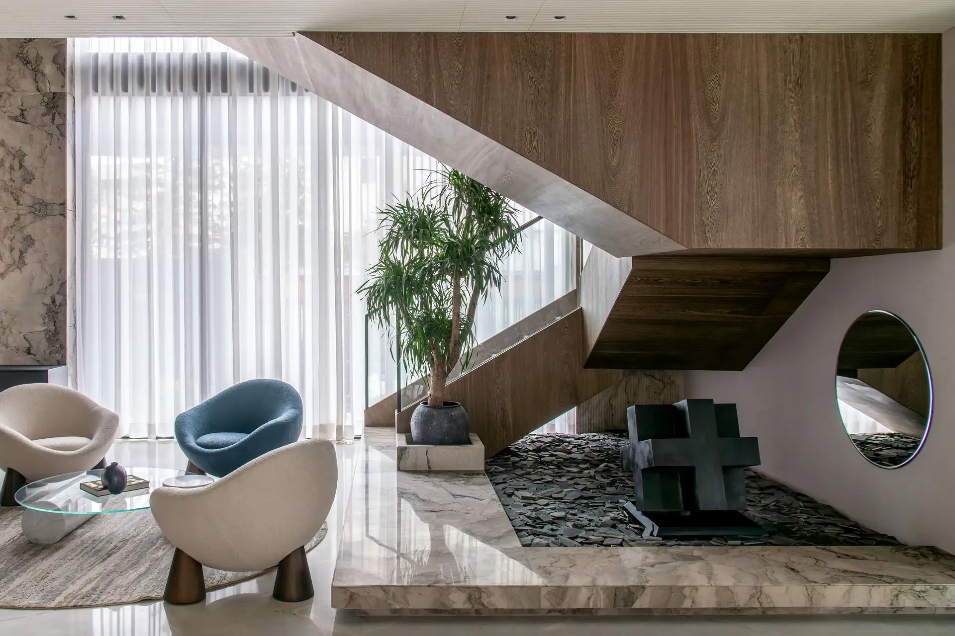 Luxury interior design in Leeds UK featuring bespoke staircase, marble flooring and turnkey project execution.